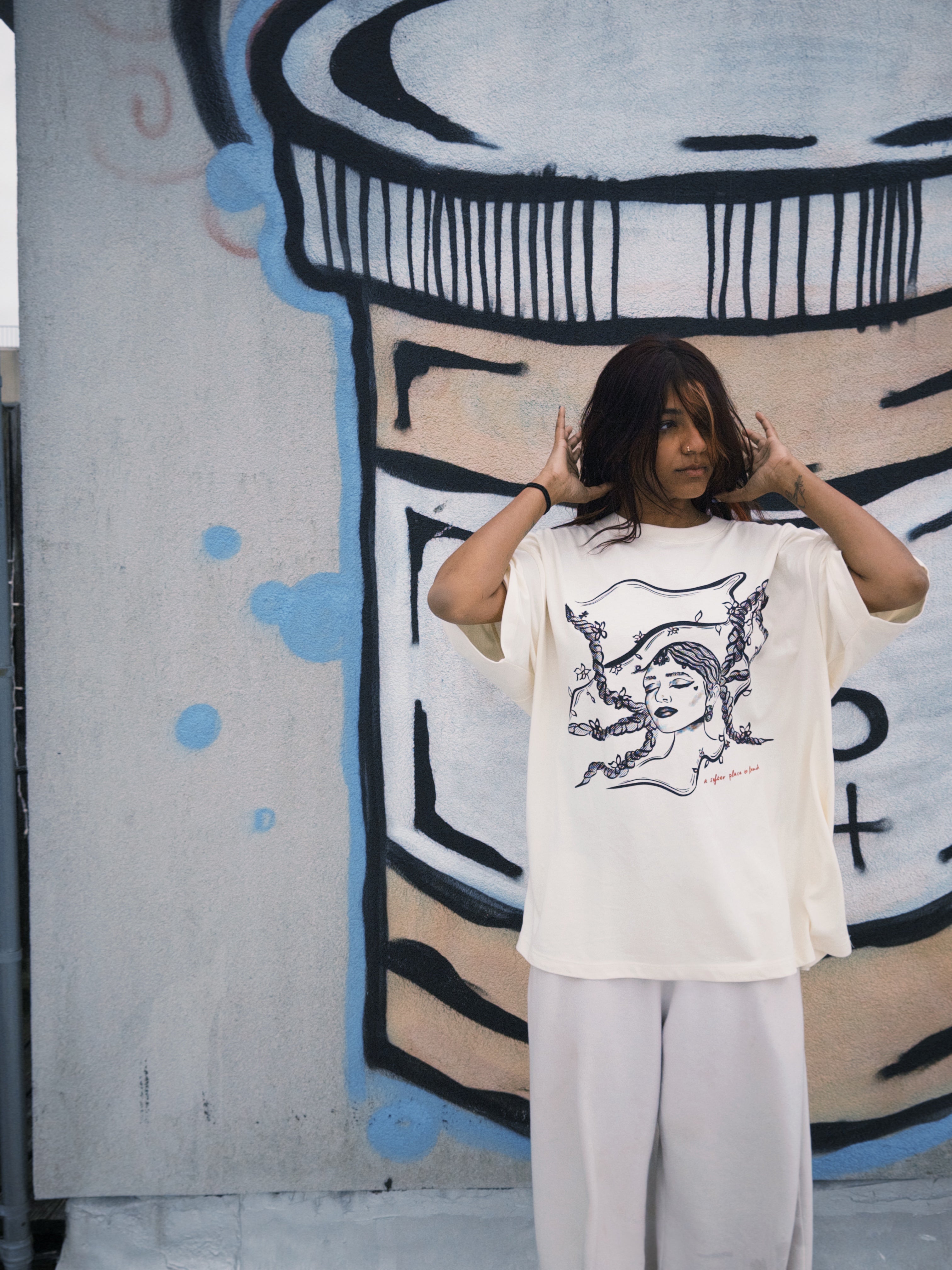 "a softer place to land" braids tee