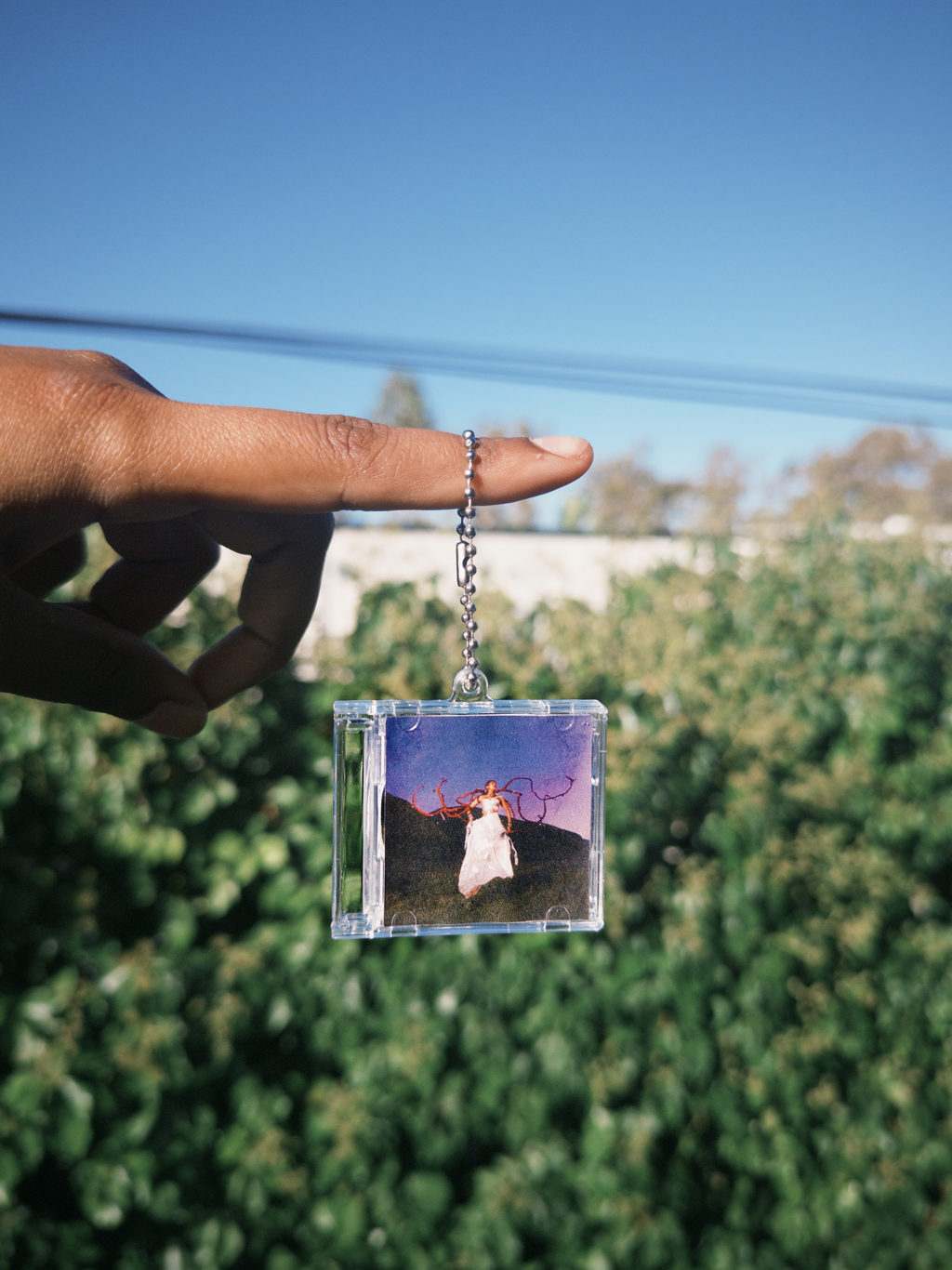 "pocket sized landing "CD keychain