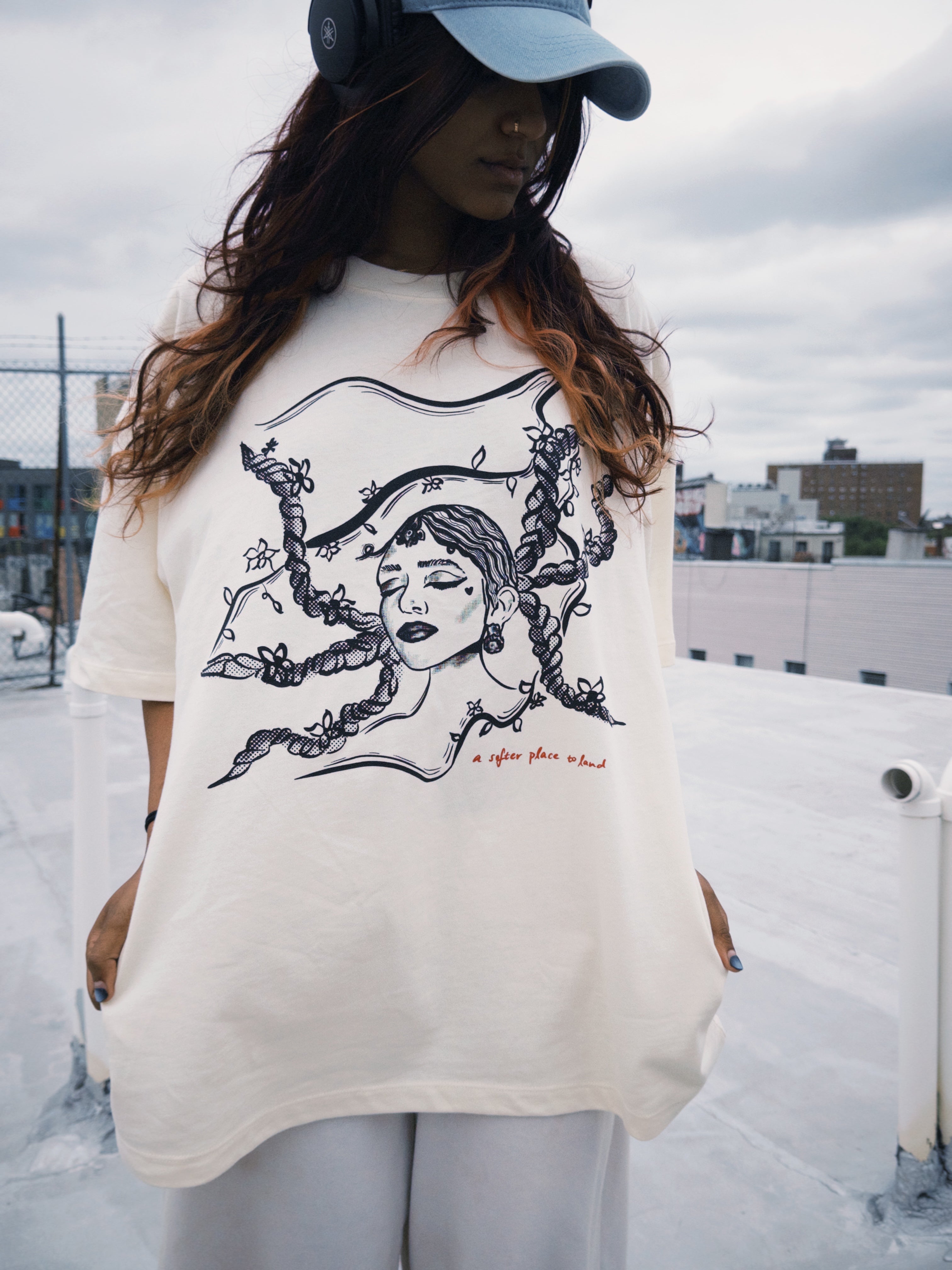"a softer place to land" braids tee