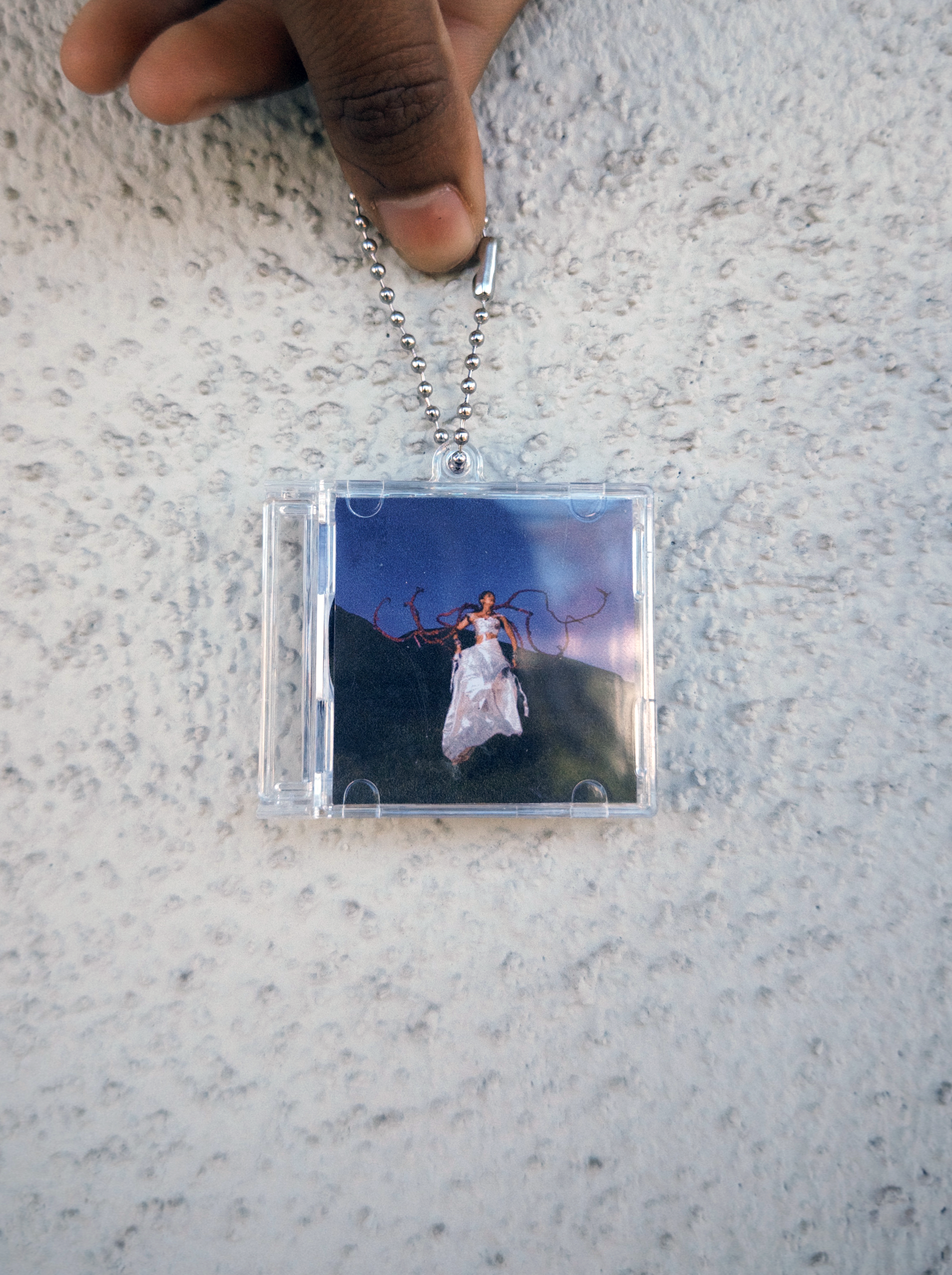 "pocket sized landing "CD keychain