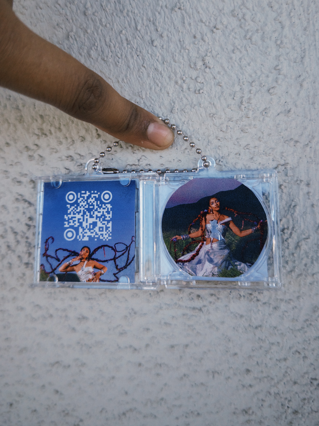 "pocket sized landing "CD keychain